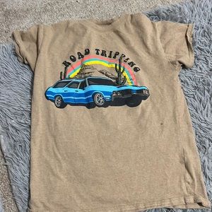 small women’s shirt. it’s more of an xs. would fit maybe a 10-12 y/o